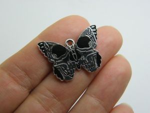 4 Moth butterfly skull charms black and silver tone HC875