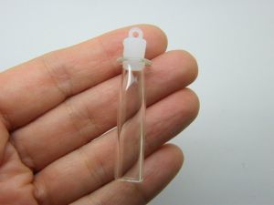 4 Mini glass bottle pendants with plastic lids M182