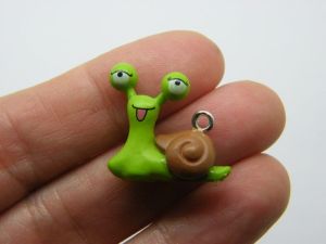 2 Snail pendants green brown resin A450