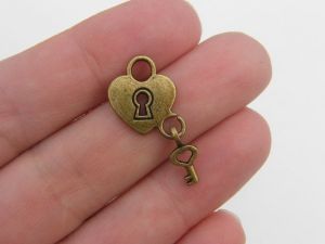 8 Heart lock and key charms antique bronze tone H83