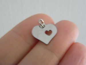 4 Heart with heart cut out charms silver tone stainless steel H254