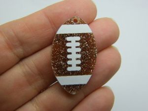4 Rugby ball pendants  white brown acrylic SP15