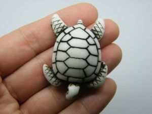 2 Turtle pendant off white and brown resin FF