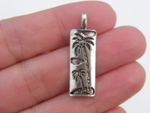 8 Palm tree island pendants antique silver tone T29