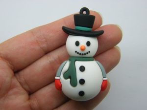 4 Snowman pendants PVC plastic 02E