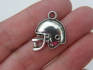 8 American football helmet charms antique silver tone SP13