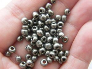 400  Silver grey glass seed beads SB.8