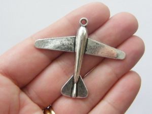 4 Aeroplane pendants antique silver tone TT36