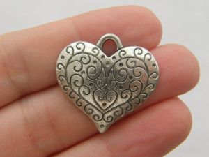 4 Heart pendants antique silver tone H51