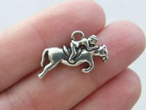 10 Horse jumping charms antique silver tone A580
