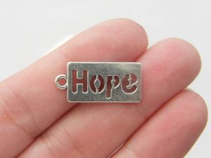 10 Hope charms antique silver tone M116