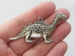 2 Dinosaur pendants antique silver tone A178
