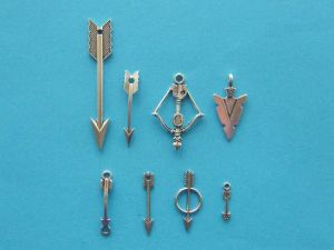 The Arrow Collection - 8 different antique silver tone charms