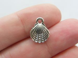 8 Shell charms antique silver tone FF232