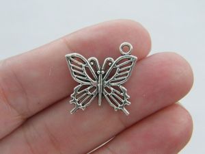 8 Butterfly charms antique silver tone A347