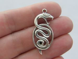 4 Snake pendants antique silver tone A54