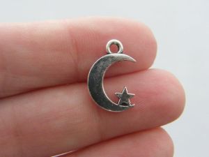 8 Moon charms antique silver tone M25