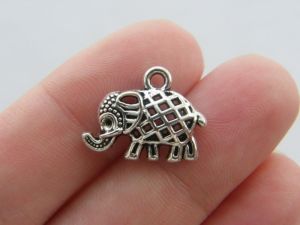 12 Elephant charms tibetan silver A500