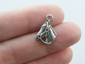 14 Horse charms antique silver tone A920