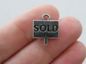 4 Sold charms antique silver tone P130