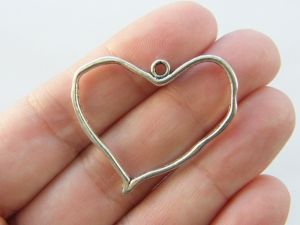 4 Heart charms antique silver tone H108