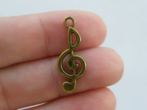 12 Music note charms antique bronze tone MN29