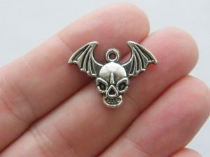 8 Skull and bat wings charms antique silver tone HC61