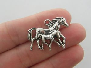 4 Horse and foal charms antique silver tone A585