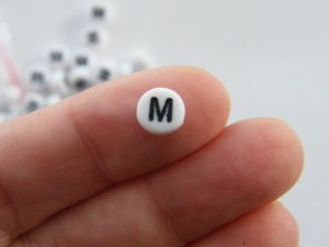 100 Letter M acrylic round alphabet beads white and black