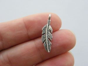 10 Feather charms antique silver tone B213