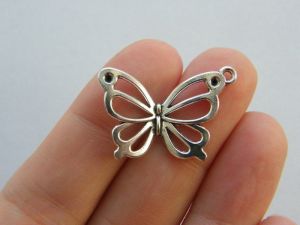6 Butterfly charms antique silver tone A332