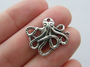 8 Octopus charms antique silver tone FF117