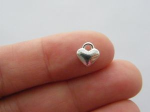 14 Heart charms silver plated tone H160