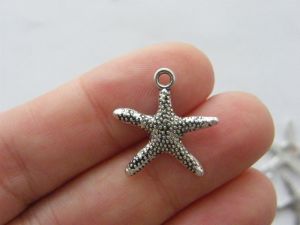 10 Starfish charms antique silver tone FF347