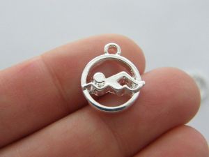 6 Swimming  charms silver plated SP172